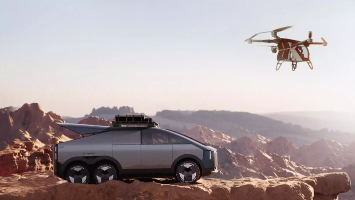 This image showcases the Xpeng Land Aircraft Carrier (LAC) in a remote, rugged environment. The vehicle, equipped with six wheels, integrates a modular drone system currently airborne in the image. The drone features foldable rotors, allowing it to transition seamlessly between ground storage and flight mode. This depiction emphasizes the LAC’s versatility in handling challenging terrains and its potential for both terrestrial and aerial applications, showcasing Xpeng's cutting-edge hybrid mobility solutions